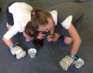 Using the space gloves isn't easy